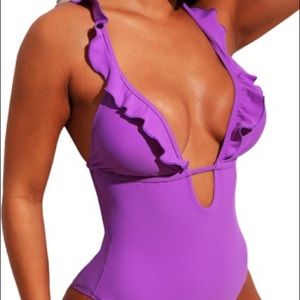 Purple plunge ruffled one piece swimsuit